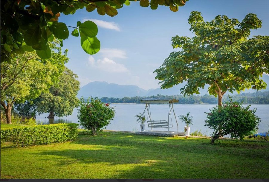Lakeside seating at The Forest Chapter by Sayaji, Madhai