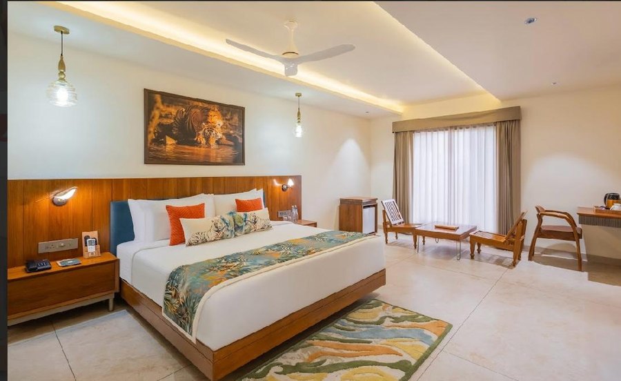 Room with seating area at The Forest Chapter by Sayaji, Madhai