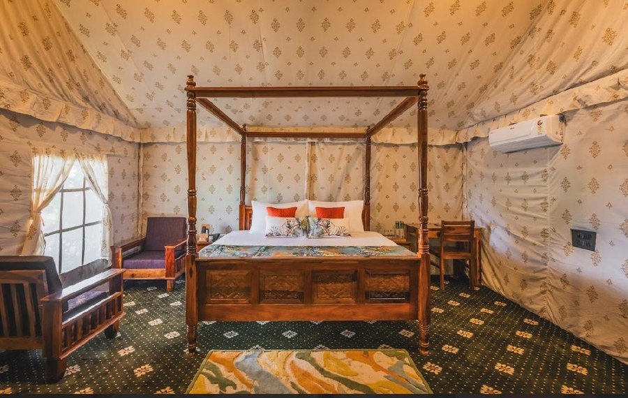 Tent interior at The Forest Chapter by Sayaji, Madhai